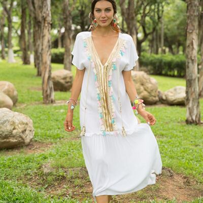 Long white dress, short sleeves with pompoms and braids