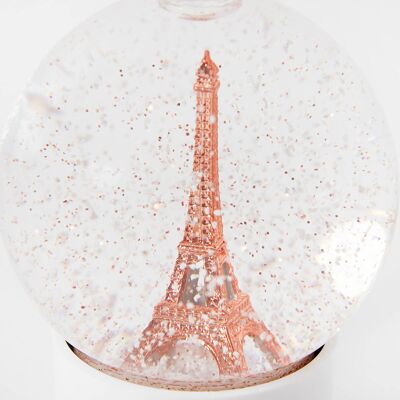 Boule à neige en verre tour Eiffel, neige et paillettes cuivrées