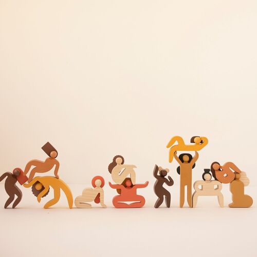 About women. Balancing game. Collection of 12 Wooden Dolls