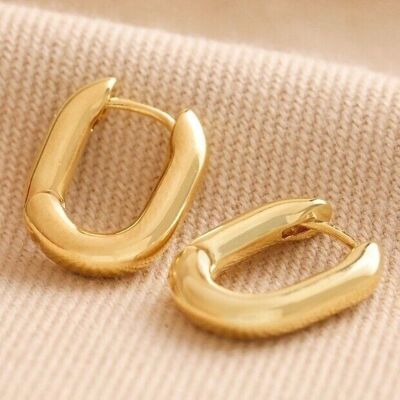 Aretes de aro ovalados Huggie en oro