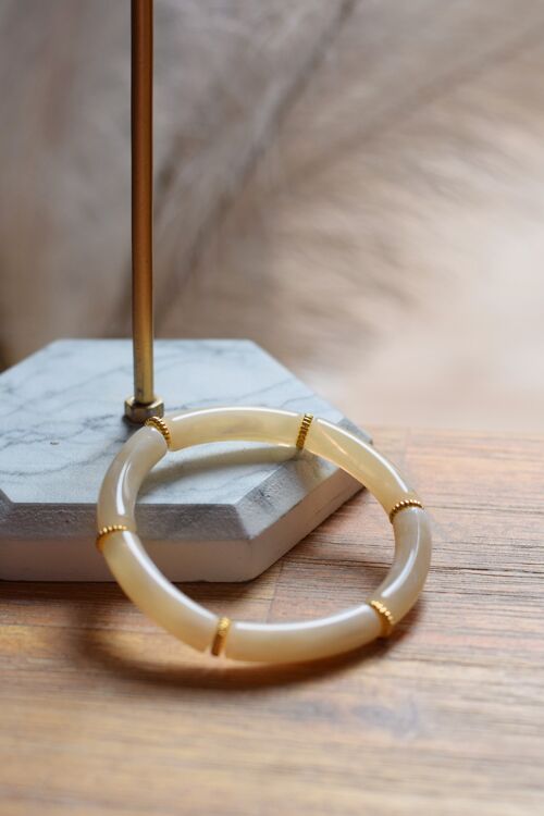 Bracelet en perles tubes acryliques fin beige marbré