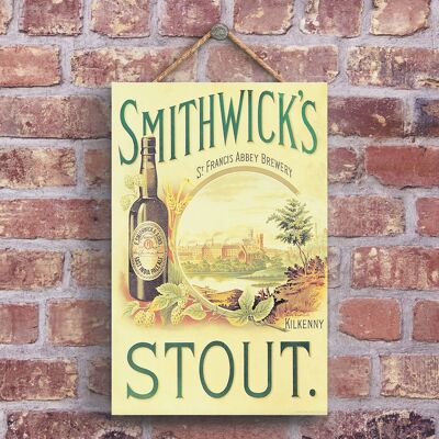 P1244 - Una classica pubblicità vintage in stile retrò Smithwicks Stout su una targa di legno