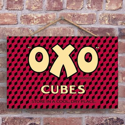 P1258 - Un anuncio clásico de estilo retro Oxo Cube Vintage en una placa de madera