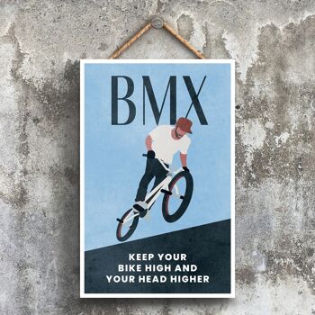 P1526 - Illustration BMX faisant partie de notre thème sportif imprimée sur une plaque à suspendre en bois 1