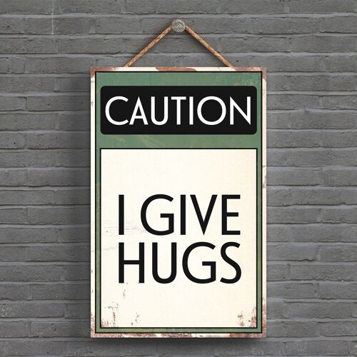 P1532 - Caution I Give Hugs Typography Sign Printed Onto A Wooden Hanging Plaque