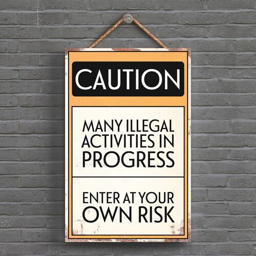 P1533 - Caution Illegal Activities Typography Sign Printed Onto A Wooden Hanging Plaque