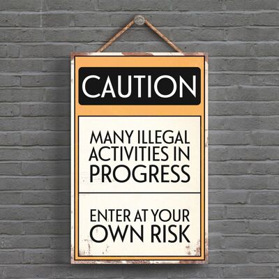 P1533 - Caution Illegal Activities Typography Sign Printed Onto A Wooden Hanging Plaque