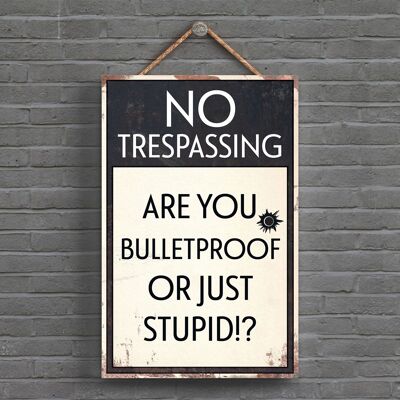 P1554 - No Trespassing Are You Bulletproof Typography Sign Printed Onto A Wooden Hanging Plaque