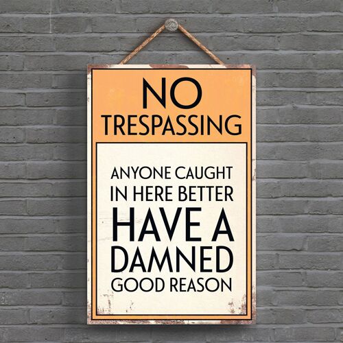 P1555 - No Trespassing Damned Good Reason Typography Sign Printed Onto A Wooden Hanging Plaque