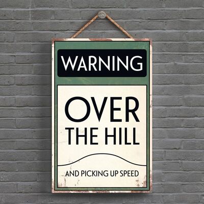 P1603 - Warning Over The Hill And Picking Up Speed Typography Sign Printed Onto A Wooden Hanging Plaque