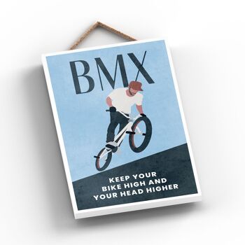 P1789 - Illustration BMX faisant partie de notre thème sportif imprimée sur une plaque à suspendre en bois 2