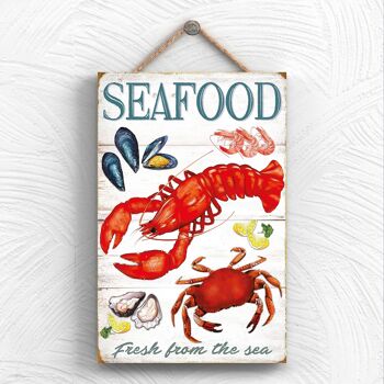 P1975 - Plaque décorative à suspendre en bois sur le thème de la cuisine du homard aux fruits de mer 1