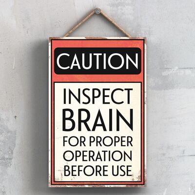 P2027 - Attenzione Ispezionare il cervello prima dell'uso Segno tipografico stampato su una targa di legno appesa
