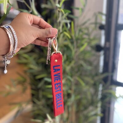 Red key ring "Life is beautiful"