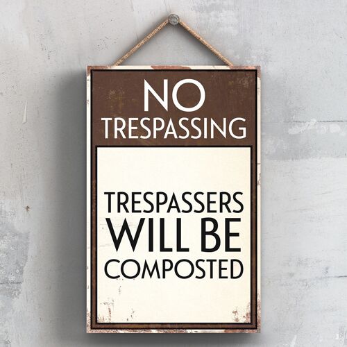 P2075 - Trespassers Will Be Composted Typography Sign Printed Onto A Wooden Hanging Plaque