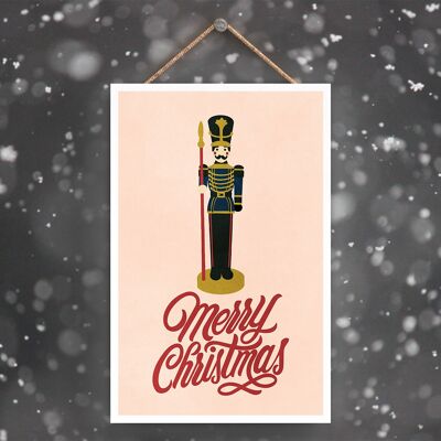 P2287 - Schiaccianoci di buon Natale e tipografia su una targa da appendere in legno con ritratto rettangolare rosa