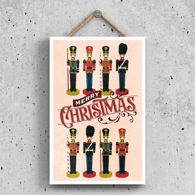 P2327 - Nussknacker der frohen Weihnachten und Typografie auf einer rechteckigen hölzernen hängenden Plakette