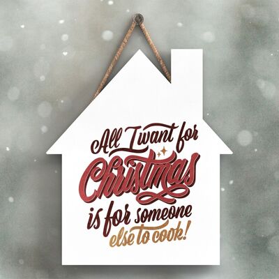 P2340 - All I Want For Christmas Rote Typografie auf einem hölzernen Hängeschild in Form eines Hauses