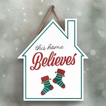P2366 - This Home Believes Stockings Typography On A House Shaped Wooden Hanging Plaque 1
