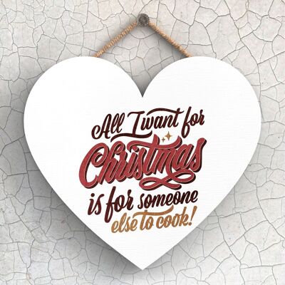 P2402 - All I Want For Christmas Red Typography On A Heart Shaped Wooden Hanging Plaque