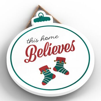 P2490 - This Home Believes Stockings Typography On A Babiole Shaped Wooden Hanging Plaque 2