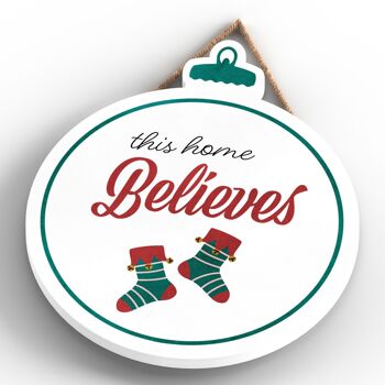 P2490 - This Home Believes Stockings Typography On A Babiole Shaped Wooden Hanging Plaque 4