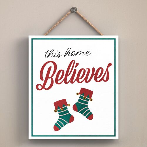 P2552 - This Home Believes Stockings Typography On An Off Square Shaped Wooden Hanging Plaque