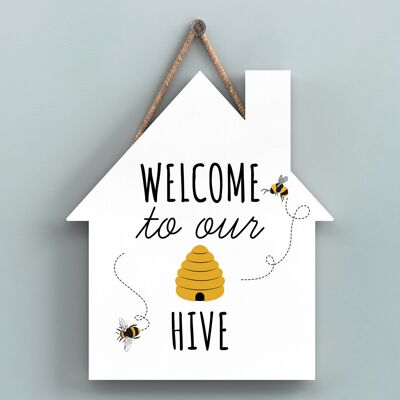 P3038 - Placa colgante con forma de casa de madera decorativa con tema de abeja de bienvenida a nuestra colmena