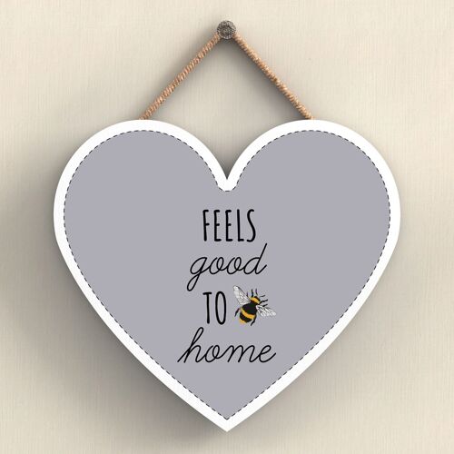 P3057 - Feels Good To Be Home Grey Bee Themed Decorative Wooden Heart Shaped Hanging Plaque