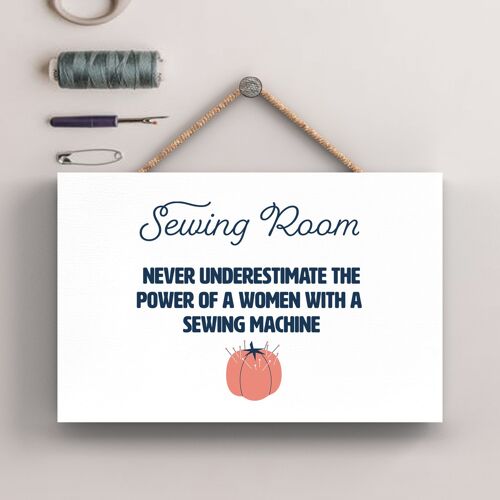 P7596 - Never Underestimate A Woman Sewing Themed Decorative Hanging Plaque