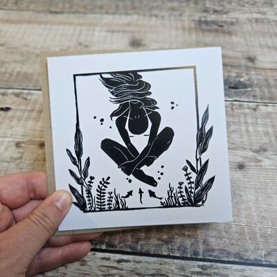 Unexpected Guest - Blank greeting card featuring a woman cross legged underwater with fish