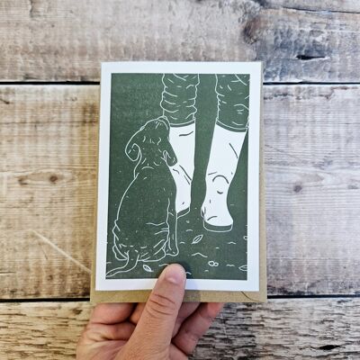 Waiting Game - Blank greeting card of a dog sat at the owners feet
