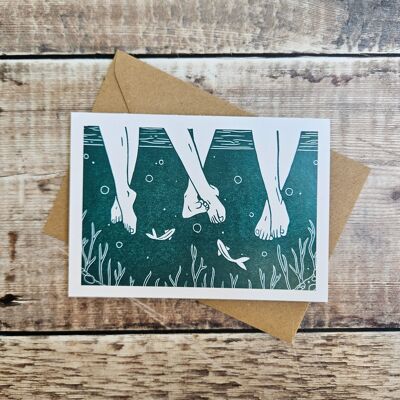 Riverside - Blank greeting card featuring three pairs of legs in a river/stream