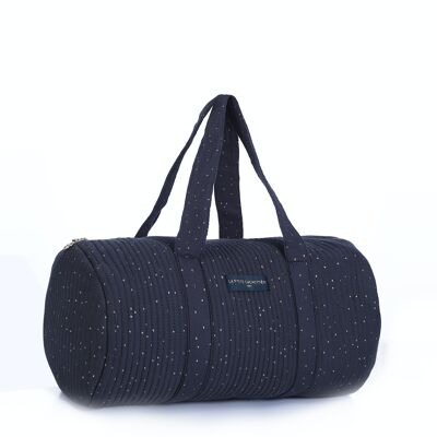 Green quilted duffel with golden polka dots