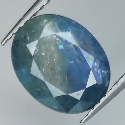 3.69ct Bleu Saphir effet soie taille ovale 10.4x8.4mm