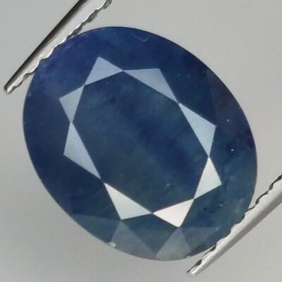 3.96ct Zafiro Azul efecto seda talla oval 10.8x8.9mm