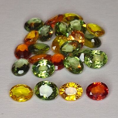 7.74ct Zafiro de Songea multicolor talla oval 4.5x3.5mm 25pz