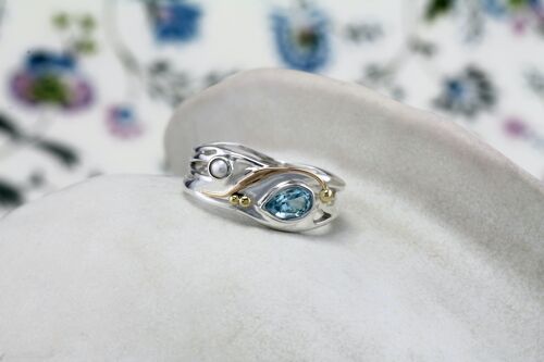 Teardrop blue topaz and pearl ring