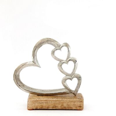 Metall-Silber-Vier-Herz-Ornament auf einem Holzsockel klein