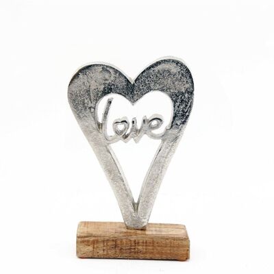 Metall-Silber-Herz-Liebe auf einem Holzsockel klein