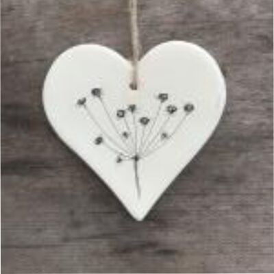 Corazón colgante con diseño botánico de semilla de allium