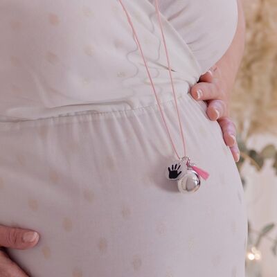 Schwangerschaft Bola kleine rosa Hand