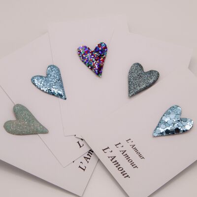 Love & Glitter - Set di 5 spille a forma di cuore glitterato nei toni del blu