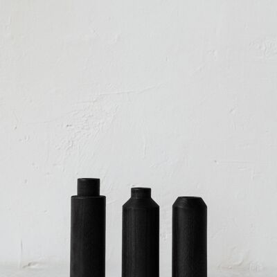 Trio of black tinted vases