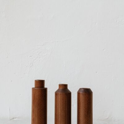 Trio of walnut stained vases