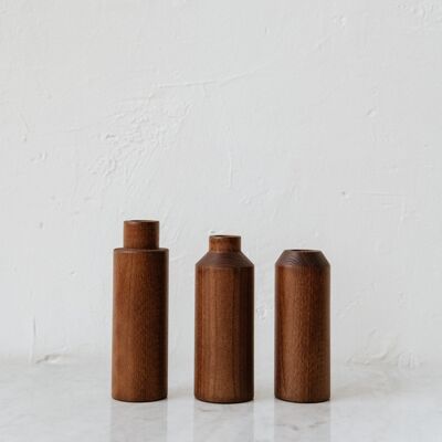 Trio of walnut stained vases