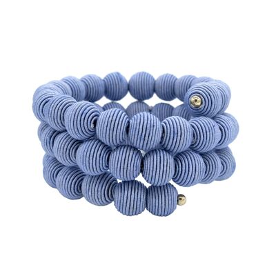 Bracelet boule tissée à ressort bleu lilas français
