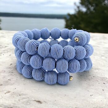 Bracelet boule tissée à ressort bleu lilas français 4