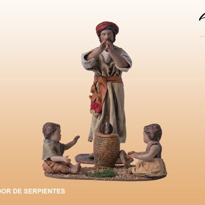 Encantador de serpientes, figura del belén