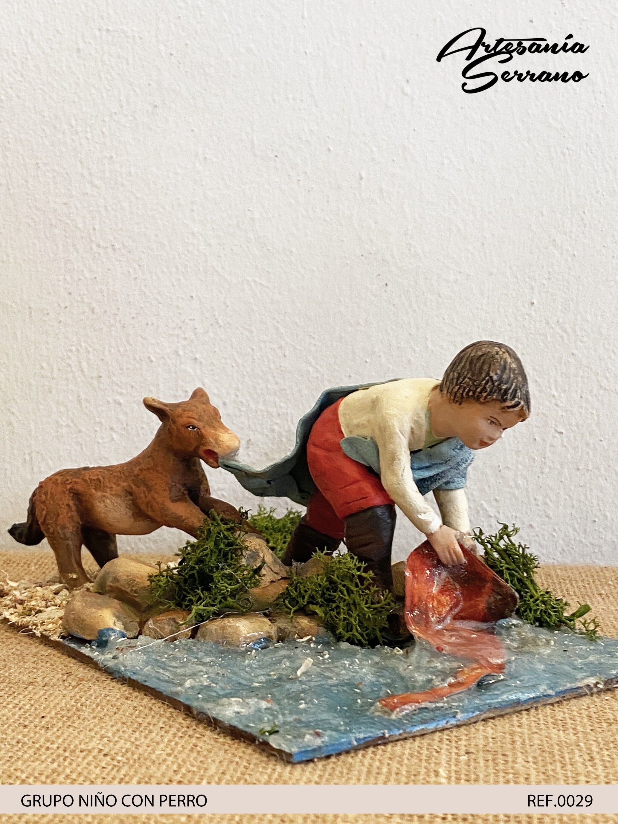 Bambino con cane, figura del presepe